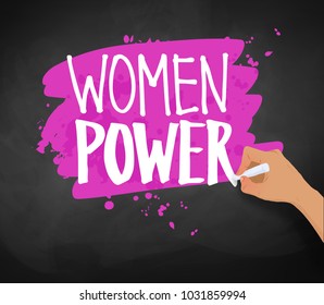 Vector illustration of female hand writing Women Power slogan with chalk on pastel pink banner on blackboard background.