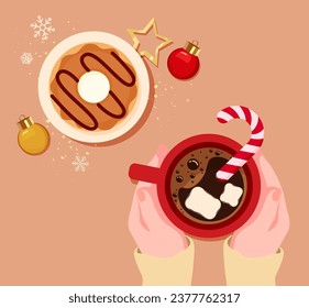 Vector illustration of female hands holding a cup of coffee with marshmallow and candy cane, plate with donut and Christmas toys. Top view of a table in a cafe. Warm time for New Year and Christmas. 