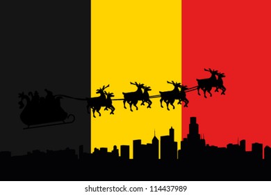 Vector Illustration of the flag of Belgium with santa flying his sliegh over a city