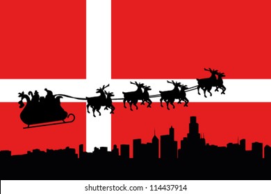 Vector Illustration of the flag of Denmark with santa flying his sliegh over a city