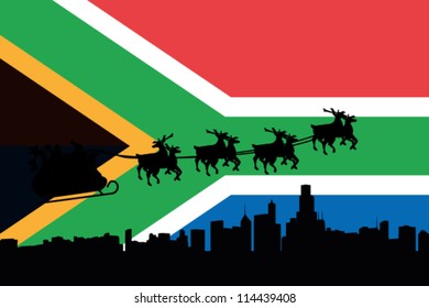 Vector Illustration of the flag of South Africa with santa flying his sliegh over a city