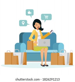 vector illustration of flat cartoon character woman sitting on sofa is enjoy shopping online. woman hold credit card on sofa surronding by shopping bag.
