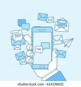 Vector illustration in flat linear style and blue colors - email marketing concept - hand holding mobile phone with mailing app on the screen