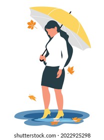 Vector illustration in a flat style of a woman in full growth, walking under an umbrella in a puddle. Isolation of autumn leaves on a white background.