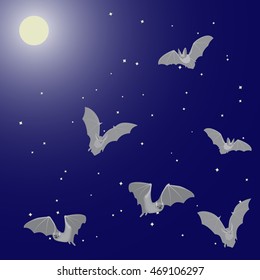 Vector illustration of flying bats in the night sky with the moon and stars