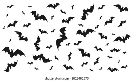 Vector illustration of flying bats on a light background.  Symbol of Halloween and fear.