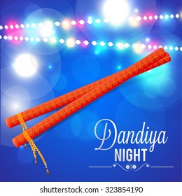 Vector Illustration of Garba Dancing Sticks with Happy Navratri text with effects for Navratri.