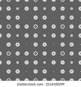 Vector illustration. Geometric seamless pattern. Solid dots and linear circles in rows. Spotted grey, black and white background. Simple monochrome abstract pattern.