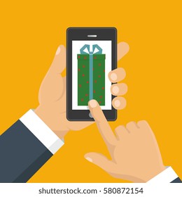 Vector illustration. Gift app page on smartphone screen. Hand hold smartphone. Mobile concept for web banners, web sites, infographics. 
