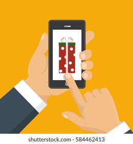 Vector illustration. Gift app page on smartphone screen. Hand hold smartphone. Mobile concept for web banners, web sites, infographics. 
