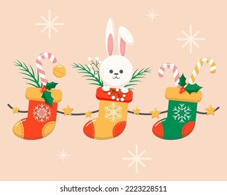 Vektorgrafik-Geschenk festliche Neujahrsocken mit Süßigkeiten und Kaninchen