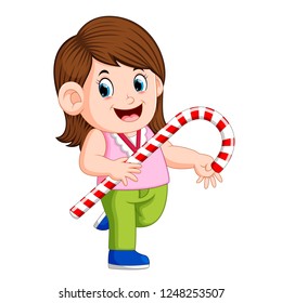 vector illustration of A girl holding big christmas candy cane