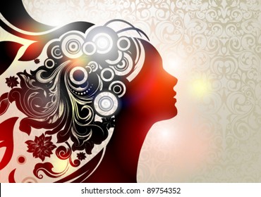Vector illustration of a girl`s profile and here stylized floral hair