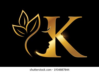 A Vector Illustration of Golden Beauty Initial Letter K in black background with Gold Shine Effect
