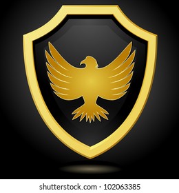 Vector illustration golden shield on a black background with an eagle