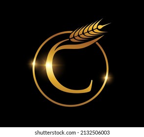 A vector illustration of Golden Wheat Grain Monogram Initial Letter C