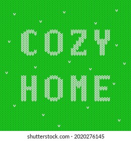 Vector illustration of a green knitted background with the phrase "cozy home".