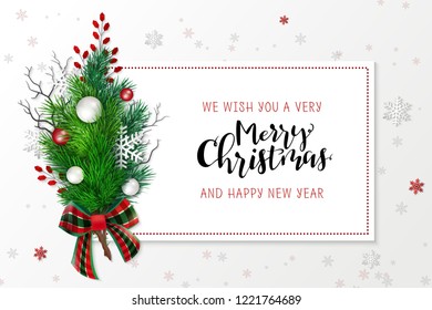 Vector illustration of greeting banner template with hand lettering label - merry Christmas - with realistic fir-tree branches, bauble, snowflakes, and decorative bead branches.