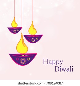 Vector illustration or greeting card for Diwali festival with Diwali elements.