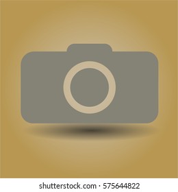 Vector Illustration of Grey Photo Camera Icon with Brown Background
