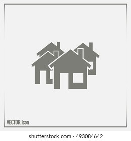 Vector illustration with group of cottages. Abstract sign of rea