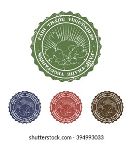 Vector illustration of grunge stamp with vegetables and "Fair Trade Vegetables" text in green, blue, red and brown colors. May be used in advertising, packaging design and your other projects.