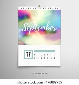 Vector illustration with hand drawing pattern. Paper spiral calendar with watercolor on backdrop. Colored spots and blotches. Realistic shadows. Inscription - September. 
