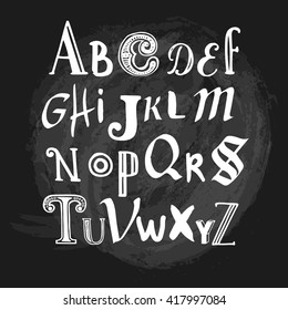 Vector illustration with hand drawn alphabet written with a brush on a blackboard. Letters in different styles.