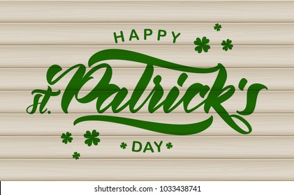 Vector illustration: Hand drawn brush type lettering of Happy St. Patrick's Day on wood background. Typography design.