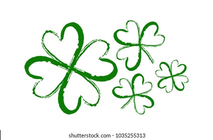 Vector illustration: Hand drawn brush shamrocks on white background. Sketch line clover.