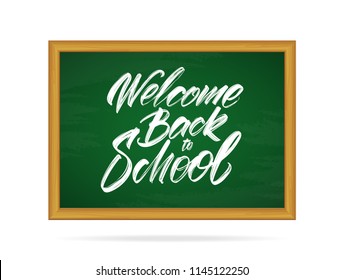 Vector illustration: Hand drawn brush type lettering of Welcome Back to School on blackboard.
