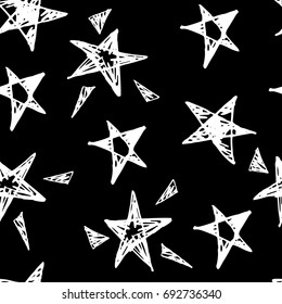 Vector illustration of hand drawn doodle seamless pattern with stars.