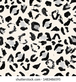 Vector illustration hand drawn leopard print seamless pattern. Black and white background