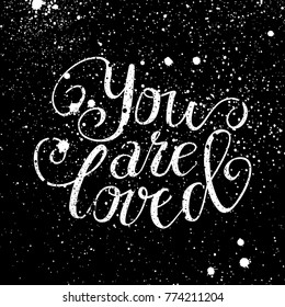 Vector illustration of hand drawn lettering - You are loved on textured background