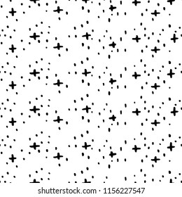 Vector illustration of hand drawn seamless pattern with crosses and dots.
