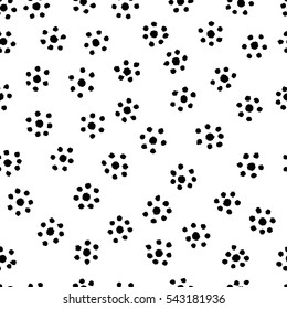 Vector illustration of hand drawn seamless pattern. Black dot flowers isolated on white background.