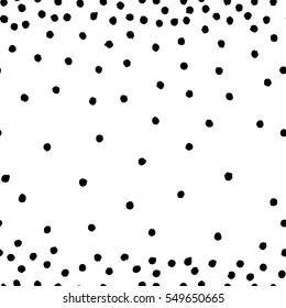 Vector illustration of hand drawn seamless pattern. Black dots isolated on white background.