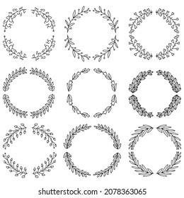 Vector illustration of hand drawn wreaths. Cute doodle floral wreath frame set.