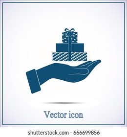 Vector illustration of a hand with a gift