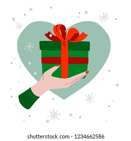 Vector illustration with hand and gift. New Year`s gifting. Christmas gift in hand