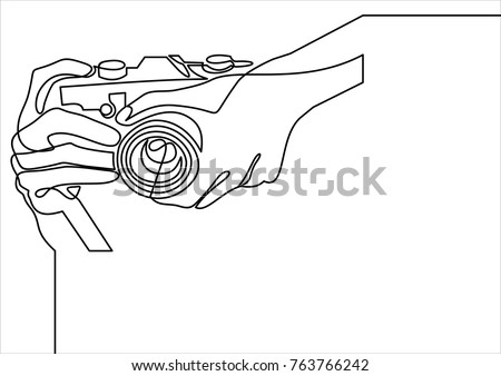 Vector Illustration of Hand Holding a Digital Camera- continuous line drawing
