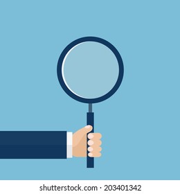 Vector illustration of hand holding a magnifying glass. Flat design