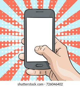 Vector illustration of hand holding mockup smartphone and thumb touching blank screen on pop art background of rays and halftone dots, Illustration in sketch retro style 