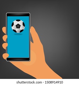 vector illustration of a hand holding a phone in blue screen and having a football ball