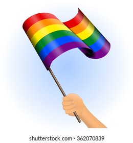 Vector illustration of a hand holding a rainbow pride flag. All elements sorted and grouped in layers