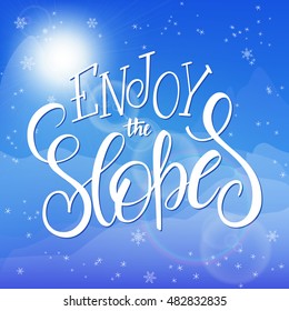 vector illustration of hand lettering winter phrase with snowflakes on sky and mountain background. Enjoy the slopes.