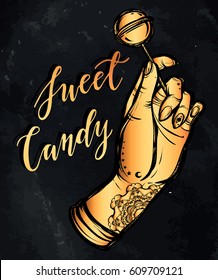 Vector illustration. Hand with a lollipop ,lettering sweet candy. Handmade, tattoos, prints on T-shirts, background chalkboard,Tattooed hand,gold color