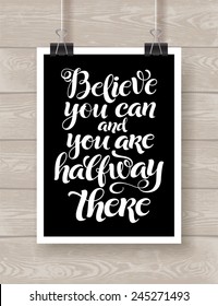 Vector illustration with hand-drawn lettering on wood background. "Believe you can and you are halfway there" poster or postcard. Calligraphic design