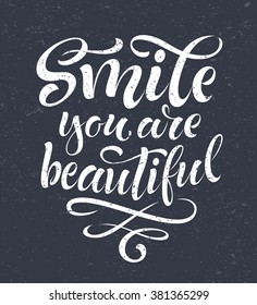 Vector illustration with hand-drawn lettering on texture background. "Smile you are beautiful" inscription for invitation and greeting card, prints and posters. Calligraphic chalk design