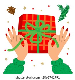 Ilustración vectorial con manos y regalo. Caja de regalos de navidad envolviendo la víspera de la Navidad. Regalo de año nuevo. Inspiración en el invierno.